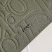 Close-up of Dior A5 Triangle Pouch’s texture