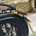 Elegant Replica CD Camera Bag displayed on a surface