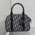 Side view of Replica Dior Medium D-Vibe Bowling Bag