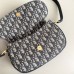Close-up of CD Besace Bag hardware and detailing