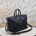 Dior Weekender 40 Black bag on display