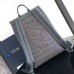 Dior Saddle Backpack with blue and white accents