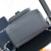 Side view of blue Dior Saddle Backpack with flap