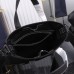 Close-up of Dior Saddle Tote Bag’s detailed stitching