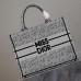 Elegant white and black Miss Dior perfume bottle