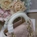 Mini Lady Dior Bag close-up of signature charms