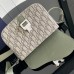 Dior Small Saddle Messenger Bag paired with casual outfit