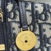Woman Wearing Black Dress with Blue Quilted Replica Bag