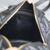 Replica Dior Groove 25 Bag displayed on a shelf