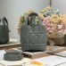 Close-Up of Dior-Inspired Metal Logo on Replica Toujours Vertical Nano Tote