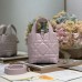 Close-Up of Dior-Inspired Metal Logo on Replica Toujours Vertical Nano Tote