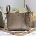 Luxury-style Dior leather bucket bag replica with metal Dior charms