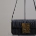 Chic Dior Flap Bag Black in luxury boutique setting