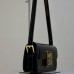 Chic black Miss Dior Flap Bag with gold hardware