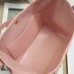 Stylish replica Dior signature bucket bag with leather trim details